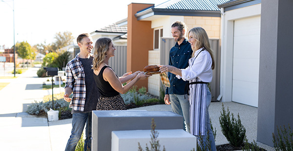 Members of the community connecting with each other by sharing food
