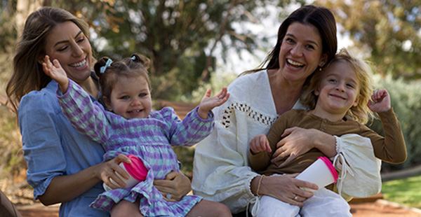A young family enjoying one of the parks in family friendly land development