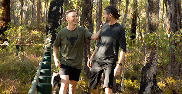 Two men walking in the Cardup National park, a green space next to Constellar Land Develooment